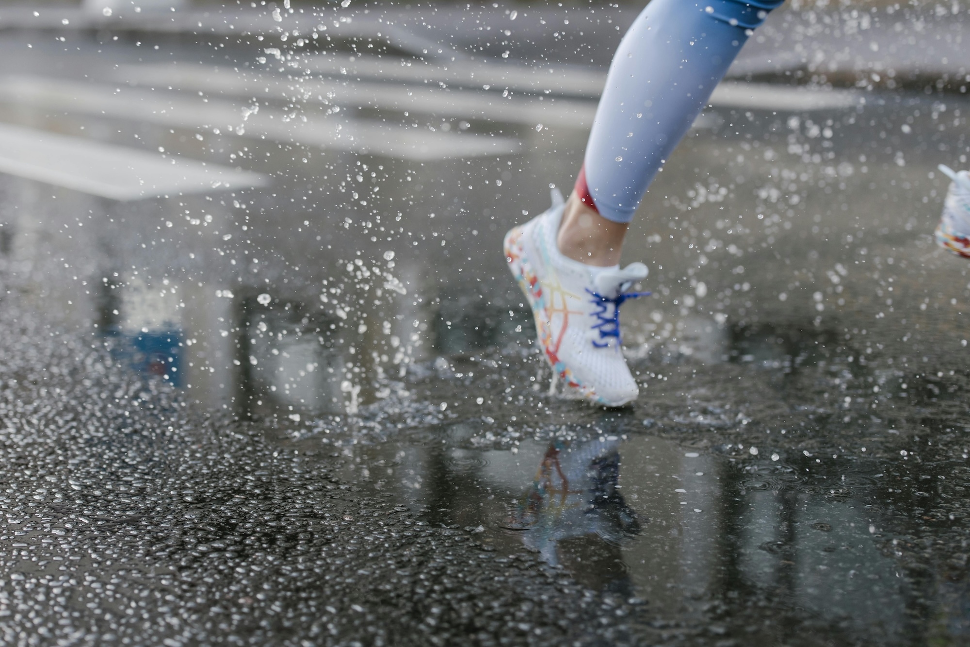 running on rainy road